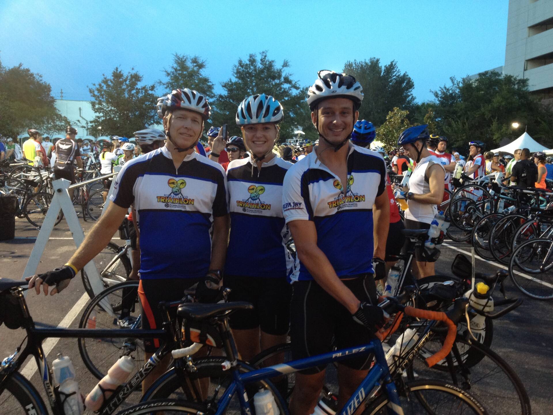 Tom (on the left), his daughter, and son-in-law before starting a century (100 mile) ride